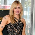 miley-cyrus-dares-to-bare-in-sheer-versace-dress-as-she’s-honored-with-hollywood-walk-of-fame-star