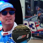 nascar-garage-watches-in-tearful-silence-as-kyle-busch’s-former-car-is-unloaded-at-track