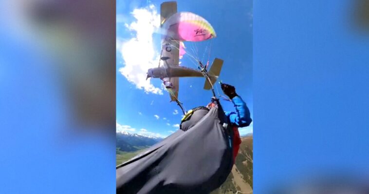 shock-video:-woman-fights-for-her-life-after-her-paraglide-is-shattered-by-small-airplane