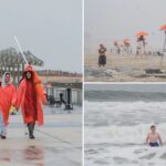 wet-memorial-day-scares-off-nyc-beach-crowds-—-but-diehard-locals-stick-it-out