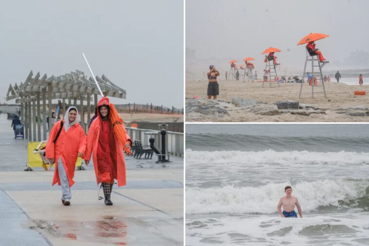 wet-memorial-day-scares-off-nyc-beach-crowds-—-but-diehard-locals-stick-it-out