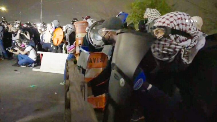 anti-ice-agitators-throw-wooden-pallets,-mattresses-at-federal-agents-during-chaotic-nj-detention-center-clash