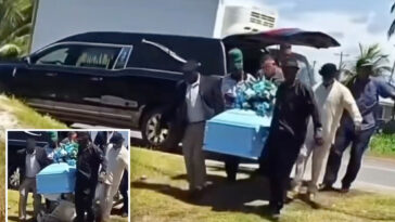 stunning-video-shows-body-fall-out-of-bottom-of-casket-at-funeral-as-horrified-mourners-scream