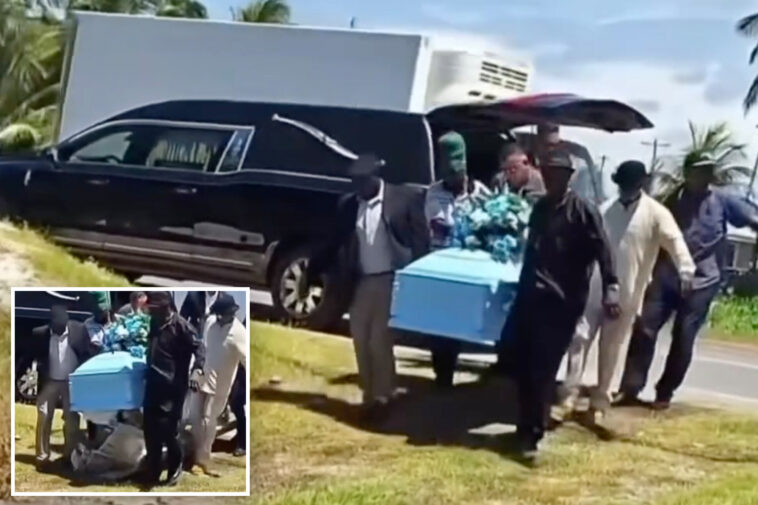 stunning-video-shows-body-fall-out-of-bottom-of-casket-at-funeral-as-horrified-mourners-scream