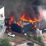explosion-rocks-dallas-apartment-building-as-massive-fire-sends-black-smoke-into-sky,-at-least-4-injured