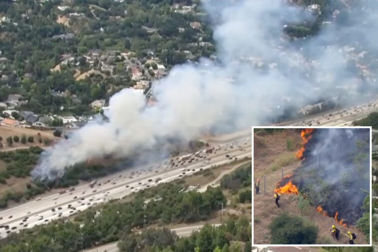 la-traffic-chaos-as-brush-fire-near-getty-center-forces-lane-closures-on-major-freeway