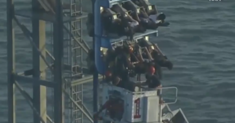 roller-coaster-malfunction-leaves-eight-riders-stranded-nearly-100-feet-in-the-air-for-hours-before-heroic-firefighters-save-the-day-(video)