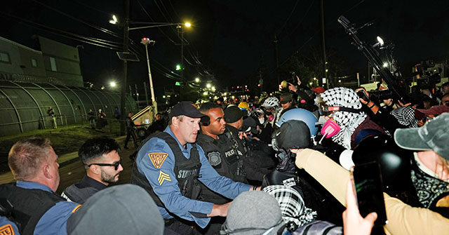watch-—-dhs:-officers-clear-antifa-rioters-from-new-jersey-ice-facility-perimeter