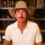 country-star-riley-green-nearly-dove-into-the-crowd-after-a-fan-split-his-ear-open-during-a-performance