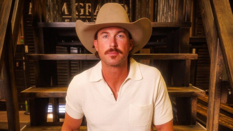 country-star-riley-green-nearly-dove-into-the-crowd-after-a-fan-split-his-ear-open-during-a-performance