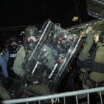 priceless-video:-living-wall-of-riot-cops-opens,-pulls-in-unsuspecting-anti-ice-punk,-closes-like-he-was-never-there