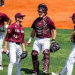 little-rock-baseball-team-celebrates-with-bus-driver-on-the-field-after-upset-win-to-advance-to-super-regional
