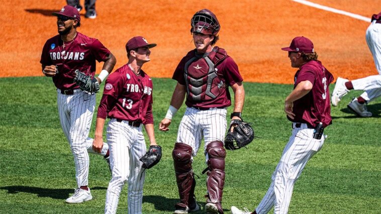 little-rock-baseball-team-celebrates-with-bus-driver-on-the-field-after-upset-win-to-advance-to-super-regional