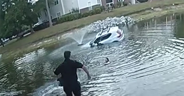 watch:-south-carolina-police-officers-rescue-unconscious-driver-from-vehicle-sinking-in-pond