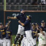 watch:-west-virginia’s-singing-of-‘country-roads’-goes-viral-after-clinching-playoff-spot