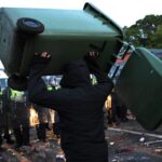breaking-video:-uk-police-retreat-as-brits-furious-about-murder-of-henry-nowak-take-to-streets,-pelt-cops-with-enormous-garbage-cans