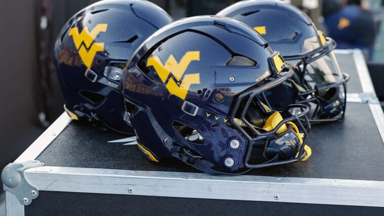 west-virginia-commit-announces-decision-by-blasting-‘country-roads,’-lighting-a-couch-on-fire