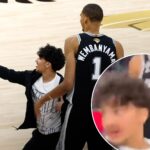 new-angle-shows-fan-storming-court-for-selfie-with-smiling-victor-wembanyama-in-knicks-spurs-nba-finals