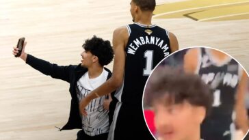 new-angle-shows-fan-storming-court-for-selfie-with-smiling-victor-wembanyama-in-knicks-spurs-nba-finals