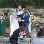 wild-video-shows-wedding-officiant-keep-ceremony-moving-even-after-best-man-hits-the-deck