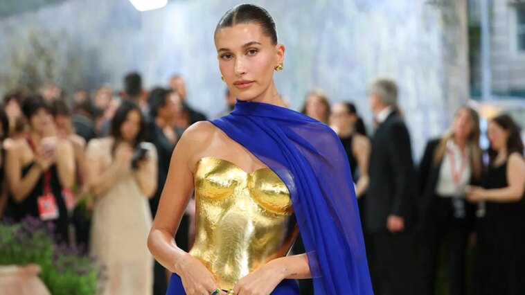 hailey-bieber-shows-off-toned-abs-in-behind-the-scenes-photos-from-new-rhode-beach-campaign