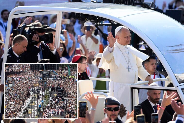 1-million-people-flood-madrid-streets-to-see-the-pope’s-flower-carpeted-procession
