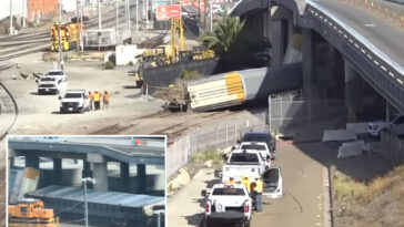 terrifying-moment-huge-train-derails-outside-petco-park-before-smashing-into-bridge