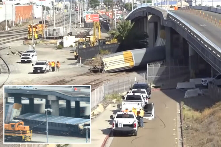 terrifying-moment-huge-train-derails-outside-petco-park-before-smashing-into-bridge
