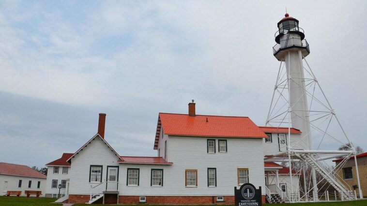 two-ladies,-a-dog,-a-lighthouse-and-a-possible-bigfoot-encounter-on-a-beach-in-michigan