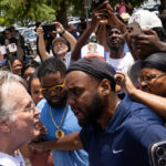 watch:-karmelo-anthony’s-grandmother-shouts-‘racist!’-and-enflames-protesters-as-she-leaves-the-courthouse