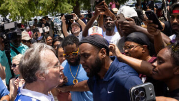 watch:-karmelo-anthony’s-grandmother-shouts-‘racist!’-and-enflames-protesters-as-she-leaves-the-courthouse