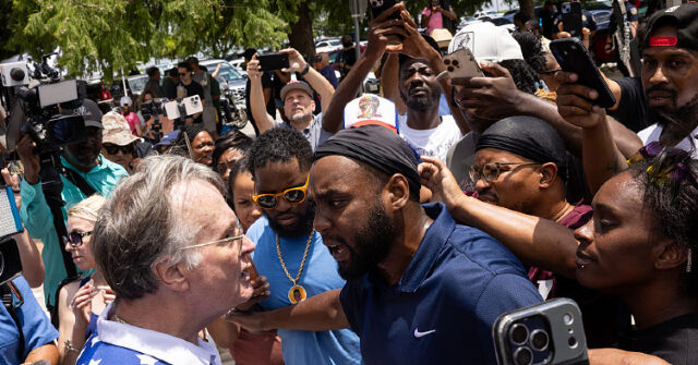 watch:-karmelo-anthony’s-grandmother-shouts-‘racist!’-and-enflames-protesters-as-she-leaves-the-courthouse