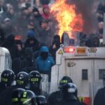 chaos-continues-in-northern-ireland:-anti-migration-rioters-clash-with-police,-set-vehicles-on-fire