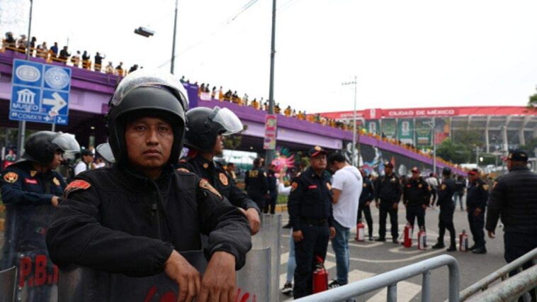 anti-government-protesters-clash-with-riot-police-outside-world-cup-opener-while-shakira-performs-inside