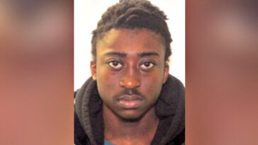 armed-and-dangerous,-one-of-the-suspected-terrorists-who-allegedly-shot-the-american-embassy-is-on-the-run,-after-killing-toronto-cop-during-gunfire-exchange