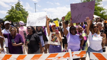 trolls-ignite-social-media-firestorm-with-photos-of-protesters-peeing-on-murder-victim-austin-metcalf’s-grave