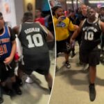 spurs-fan-in-dennis-rodman-jersey-tries-fighting-every-knicks-supporter-at-penn-station