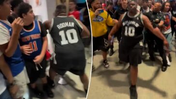 spurs-fan-in-dennis-rodman-jersey-tries-fighting-every-knicks-supporter-at-penn-station