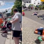 elderly-woman-on-mobility-scooter-drives-into-bike-race,-causing-mass-collision-as-cyclists-somersault-over-handlebars:-video