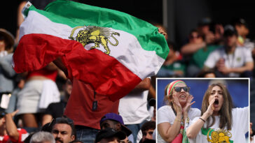 iranian-world-cup-soccer-fans-wave-pre-revolutionary-flag-inside-stadium-despite-fifa-ban