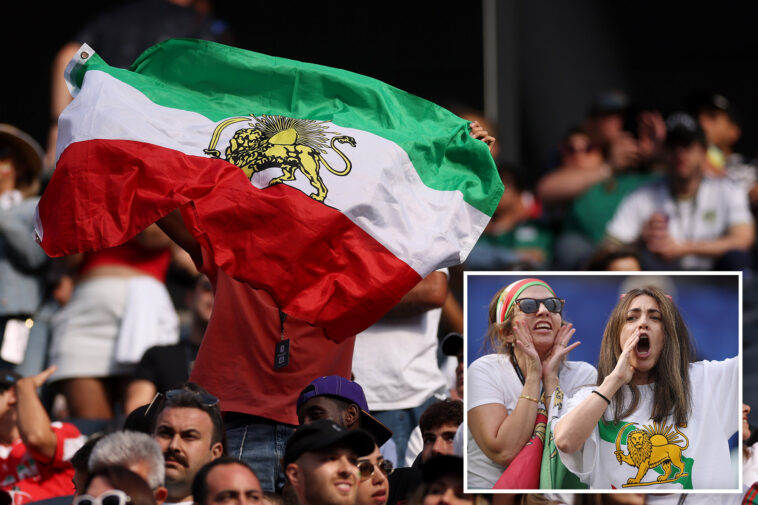 iranian-world-cup-soccer-fans-wave-pre-revolutionary-flag-inside-stadium-despite-fifa-ban