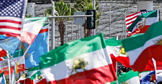 video:-iran-fans-defy-fifa-autocrats-and-fly-pre-revolutionary-flags