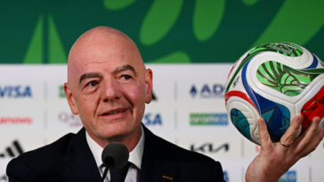 fifa-boss-gianni-infantino-comforts-iran-team-after-world-cup-tie-against-new-zealand