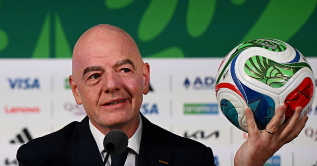 fifa-boss-gianni-infantino-comforts-iran-team-after-world-cup-tie-against-new-zealand