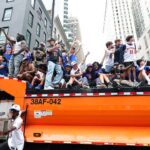 knicks-fans-climb-on-police-cars,-sanitation-trucks-as-countless-others-unable-to-get-into-jam-packed-parade