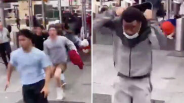 dramatic-video-shows-gunshots-ring-out-in-times-square,-sending-tourists-running-for-their-lives