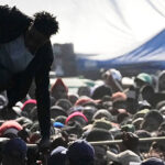 police-battle-migrant-protesters-at-south-african-deportation-facility