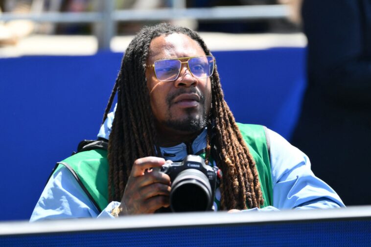 marshawn-lynch-works-as-photographer-for-usa-vs-australia-match