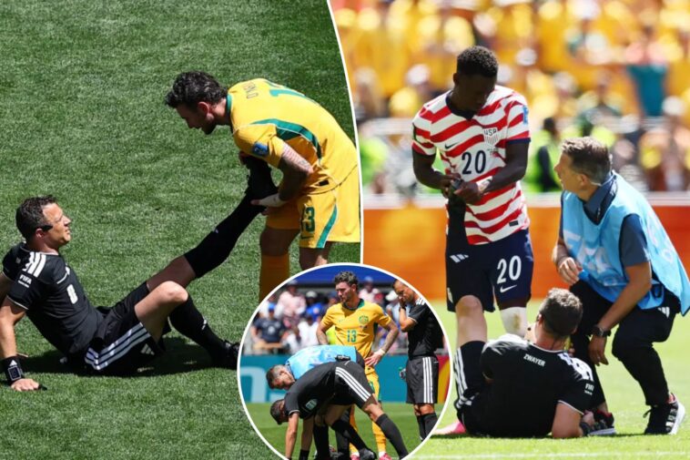 usmnt-australia-referee-goes-down-with-cramps-in-‘embarrassing’-world-cup-scene
