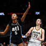 angel-reese-makes-wnba-history-in-win-over-caitlin-clark’s-fever